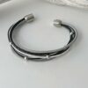 Lederarmband aus Nappa schwarz und grau weiß