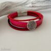 Lederarmband mit kleine Phaistos Scheibe in rot-pink