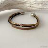 Lederarmband mit Glitzer gold-schwarz mit einem Sternchen