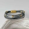 Lederarmband aus Nappa und Gold in schwarz und grau