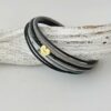 Lederarmband mit Herzchen Gold in schwarz und grau