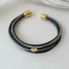 Lederarmband mit Herzchen Gold schwarz grau